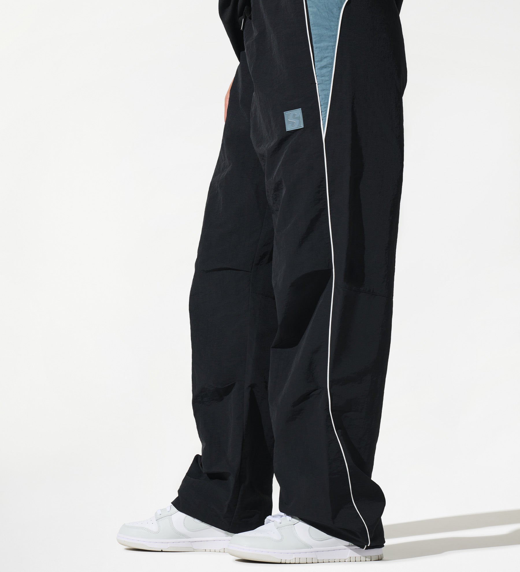 Astro Track Pants [Black/Storm Blue]